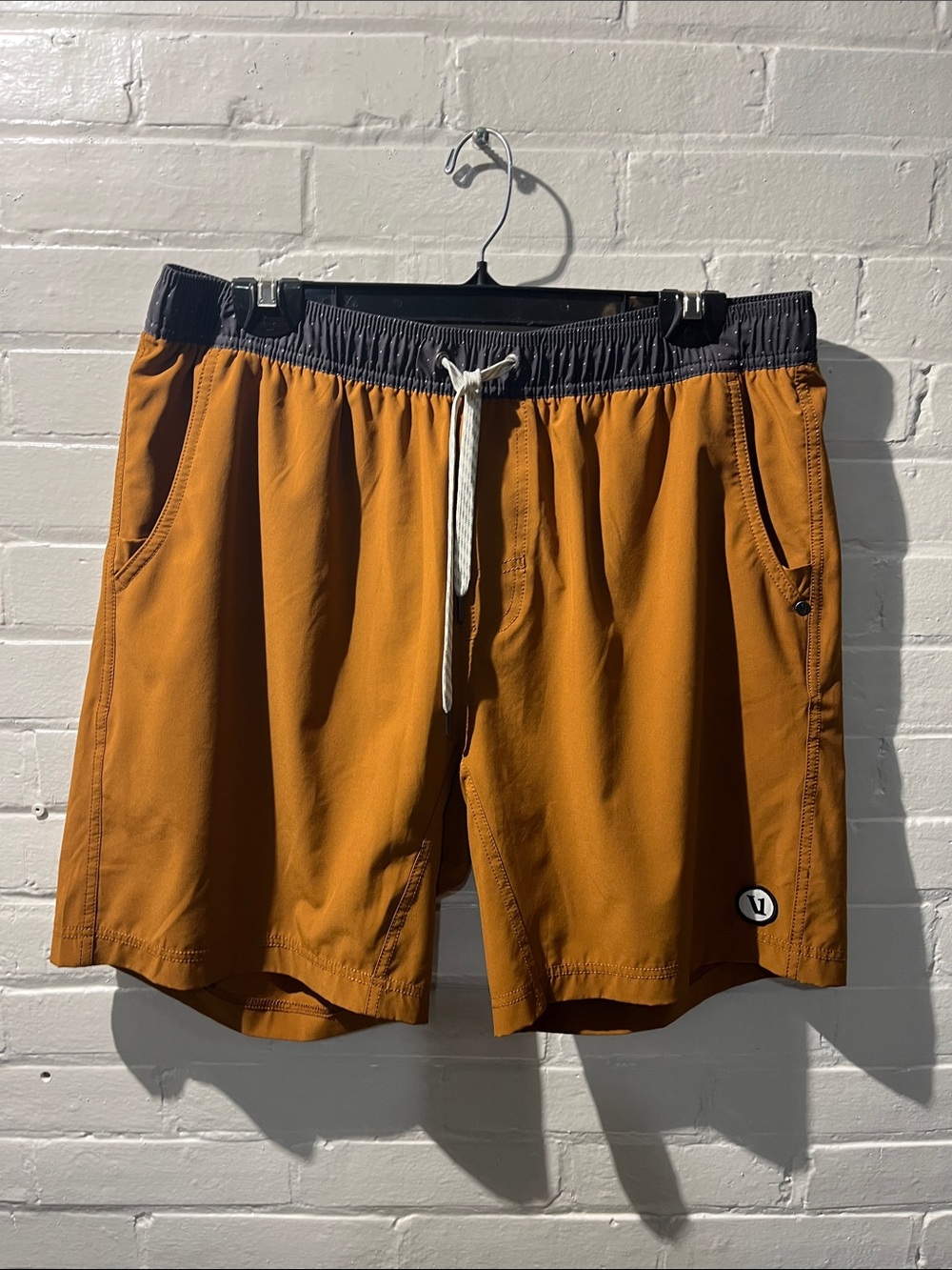 Vuori Rust Orange Swim Trunks with Dark Gray Waistband